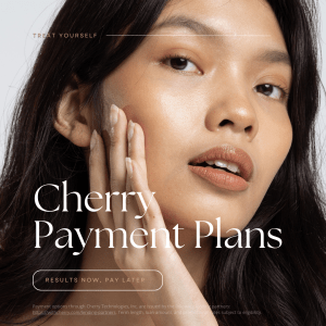 Woman with smooth skin gently touching her face, promoting Cherry Payment Plans financing options for ZO Skin Health treatments and services.